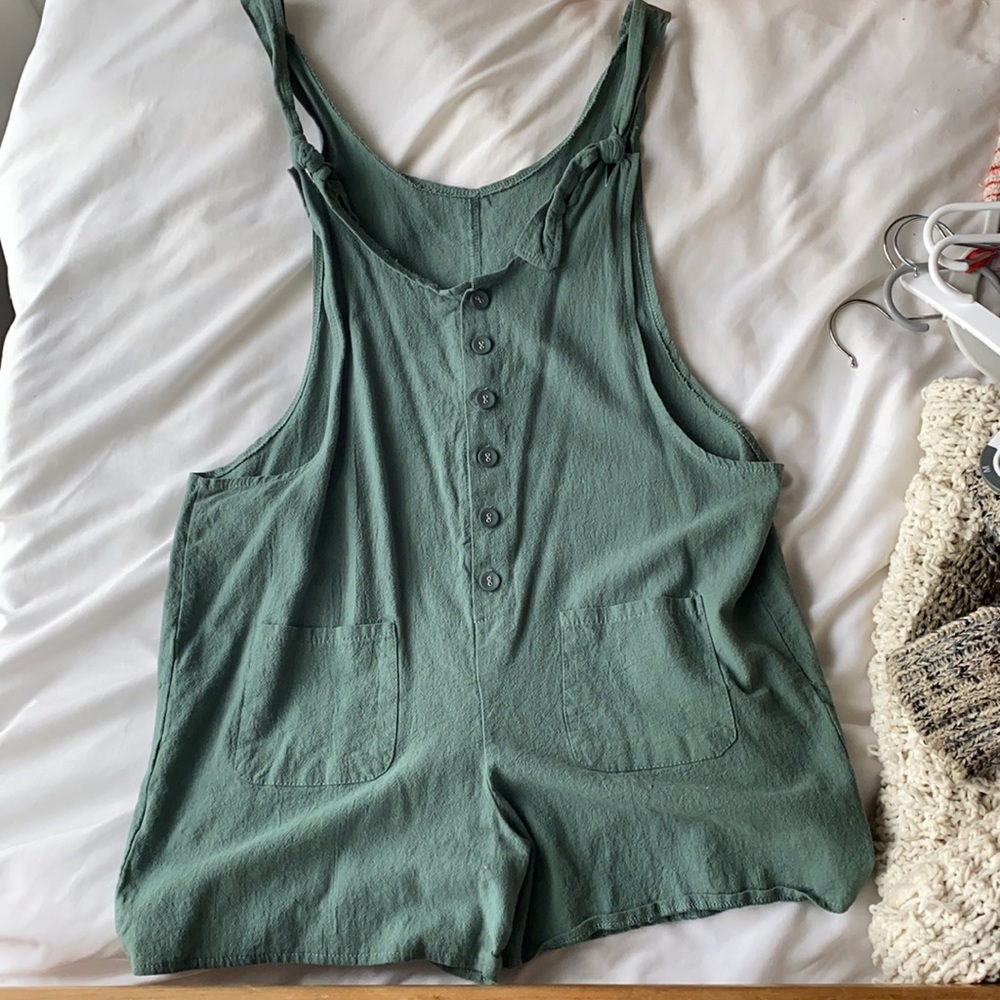Green romper button tie small